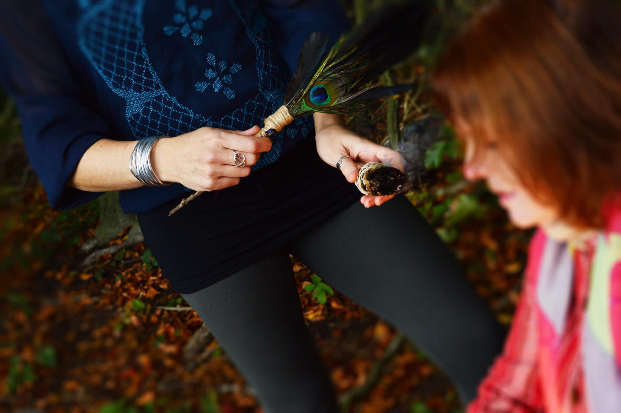 Smudging with herbs to cleanse the space