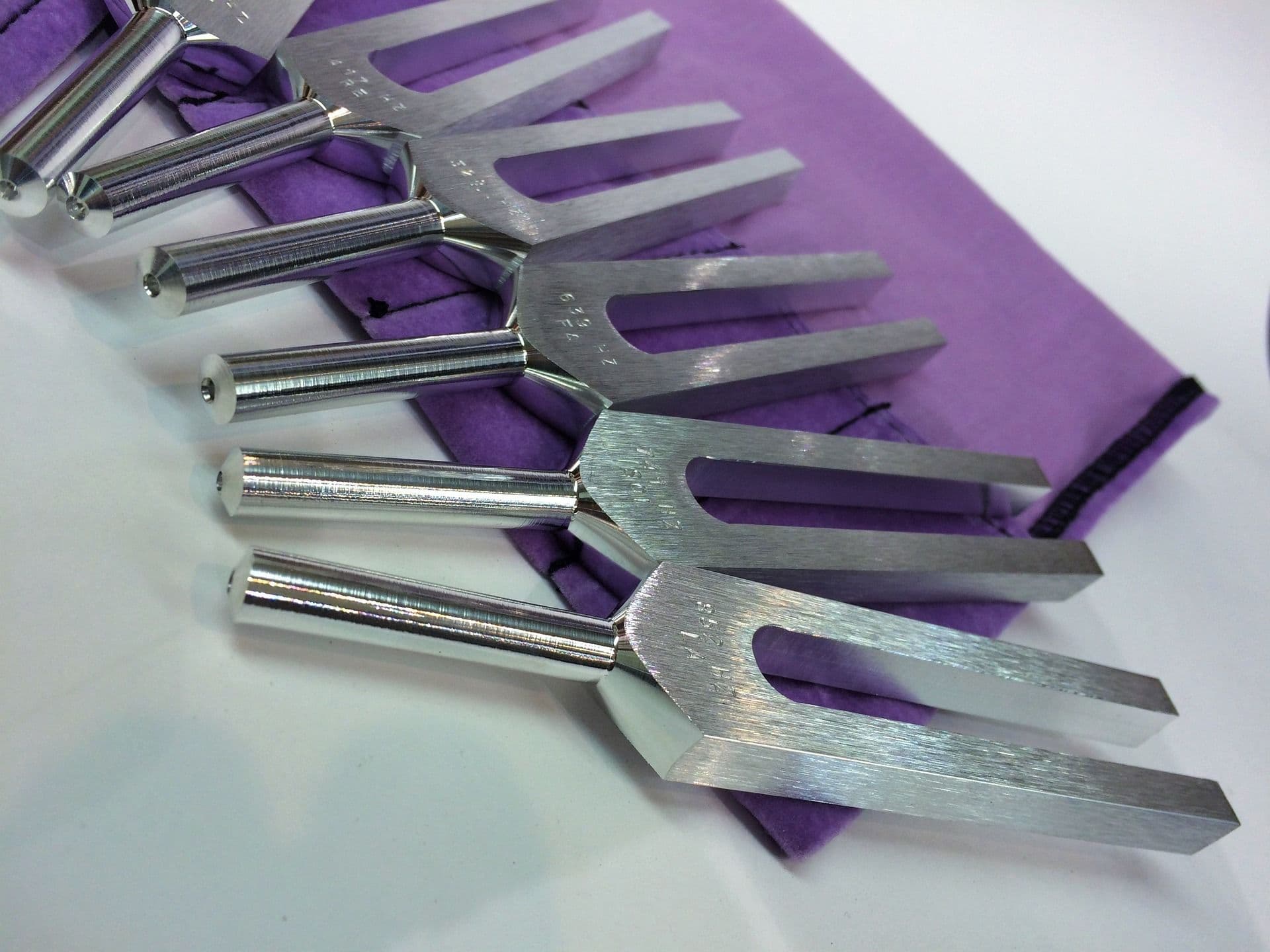 A set of steel tuning forks used for sound healing